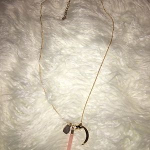 Gold necklace with charms